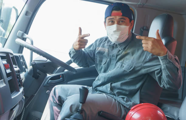 istock Truck driver wearing a mask 1221783114