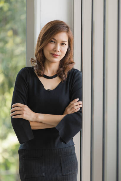 istock Lady in black dress 1221783742