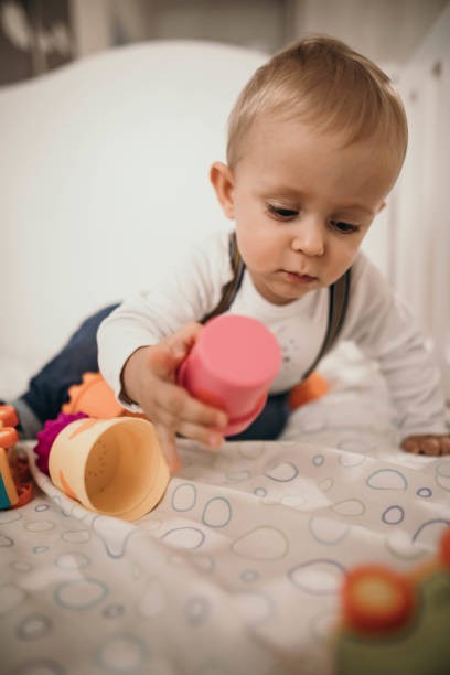 istock Young cute child in crib 1221783917