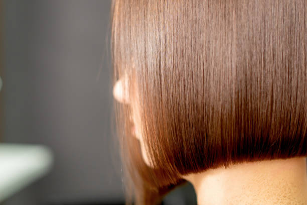 istock Combing hair of woman. 1221789749