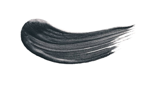 istock Black stroke fluid cosmetic volcanic clay or activated charcoal for face mask stroke isolated on white background. 1221789900