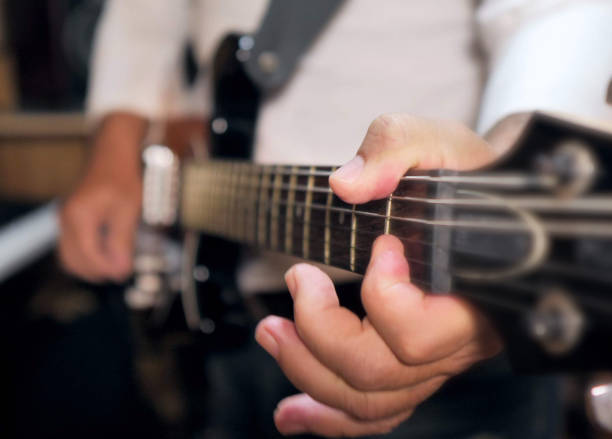 istock Guitarist playing his electric guitar 1221791477