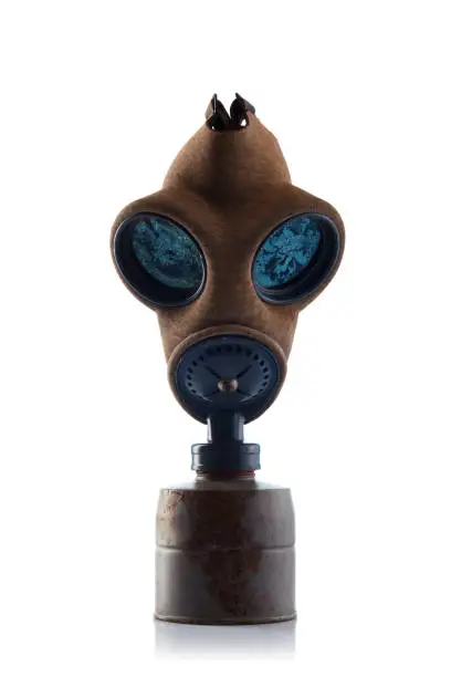 Photo of Old-fashioned military gas mask on white background