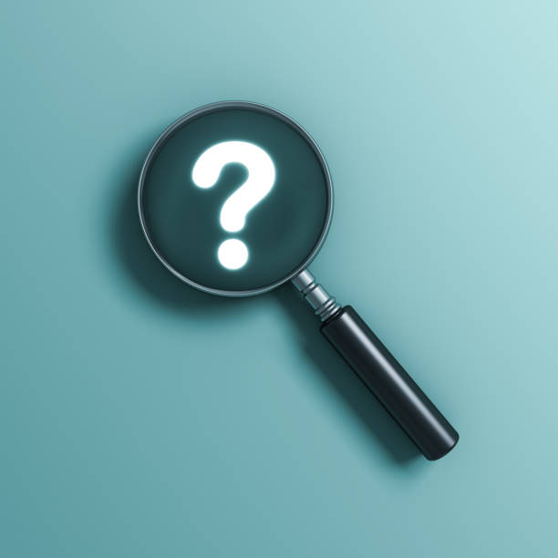 istock Magnifying glass and Neon light question mark isolated on green blue pastel color wall background with shadows 1221793146