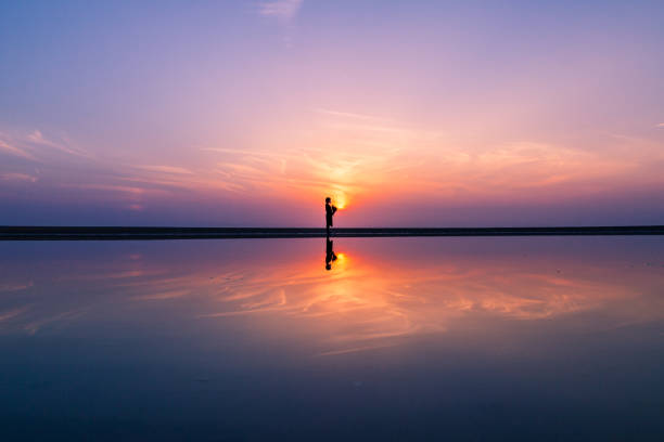 istock japan kagawa ocean person silhouette 1221793270
