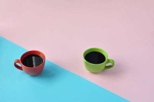 istock Americano in the different cups on the pink background. 1221794116
