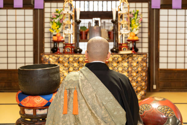 istock Monk praying at the temple 1221794675