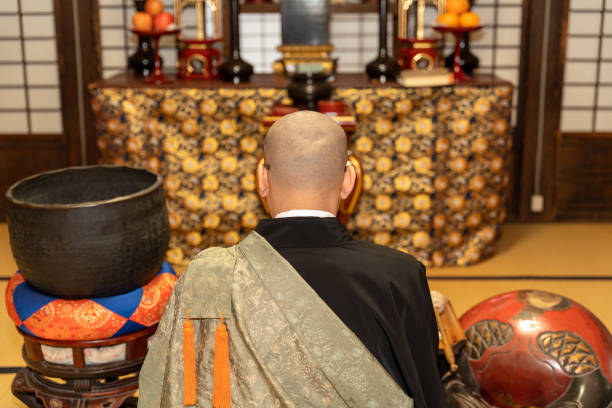 istock Monk praying at the temple 1221794677