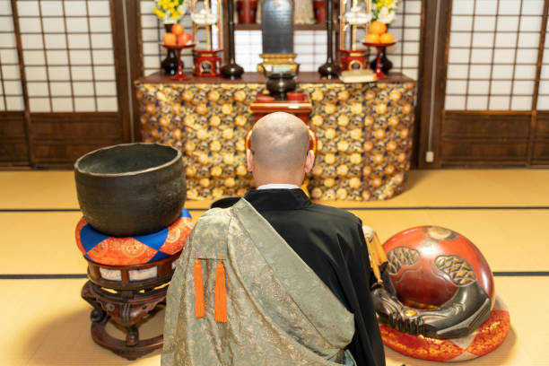 istock Monk praying at the temple 1221794751