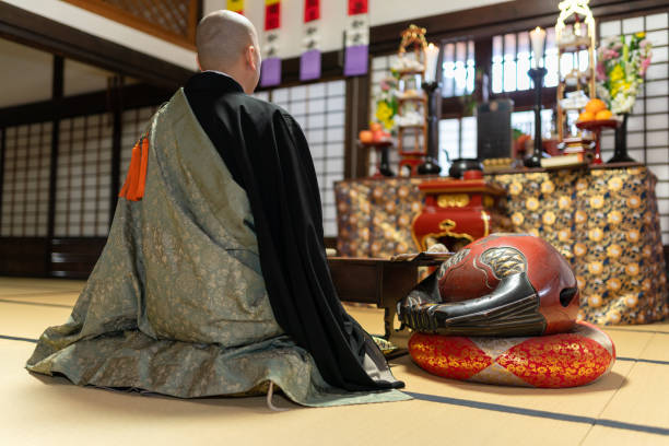 istock Monk praying at the temple 1221794775