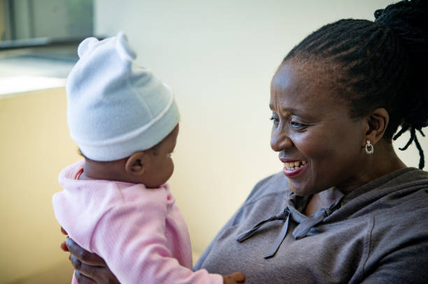 istock Grandmother and baby interacting 1221794780