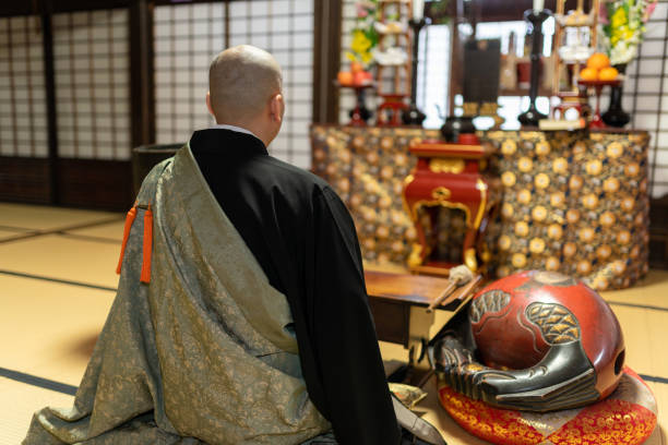 istock Monk praying at the temple 1221794794