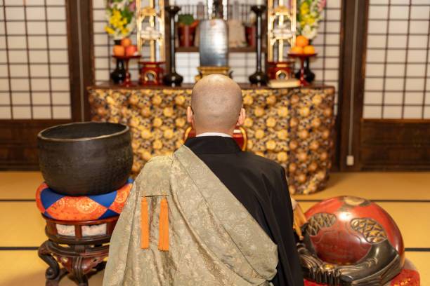 istock Monk praying at the temple 1221794795