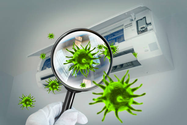 3D simulation of viruses inside the air conditioner by showing through a magnifying glass Expanded simulation of coronal viruses in the air purity stock pictures, royalty-free photos & images