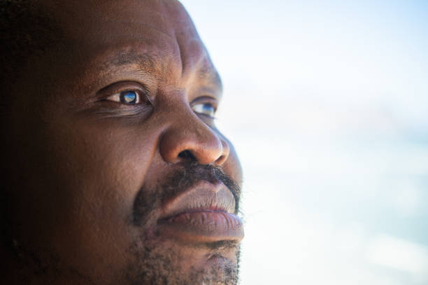 istock African senior male close up face 1221797404