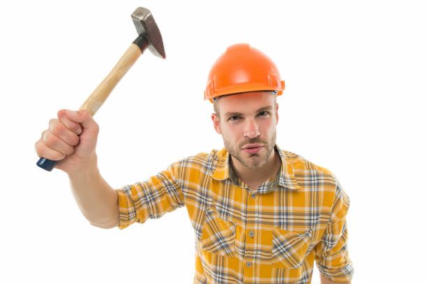 istock Having always hand at carpentry. Carpenter hold hammer isolated on white. Carpentry and renovation. Carpentry shop. Home improvement business. Building and construction. Being skilful at carpentry 1221799231