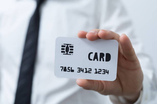 istock finance money - CREDIT CARD paper. 1221800496