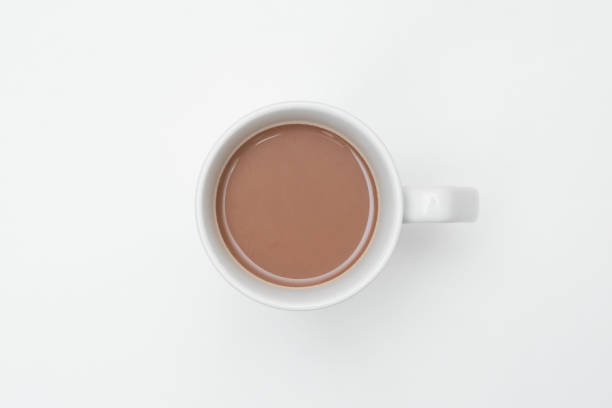 istock Top view of Coffee in a white cup on white background 1221800528