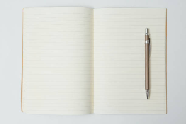 istock Top view of Pen, notebook on white background 1221800533