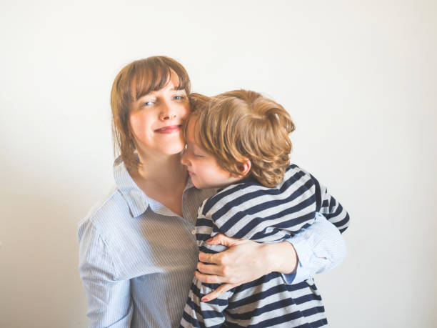 istock Young mother and child hugging. Mothers day 1221801672