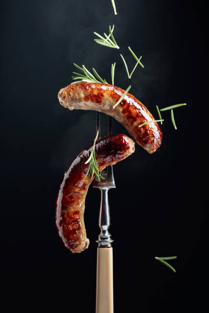 istock Grilled Bavarian sausages with rosemary. 1221803057