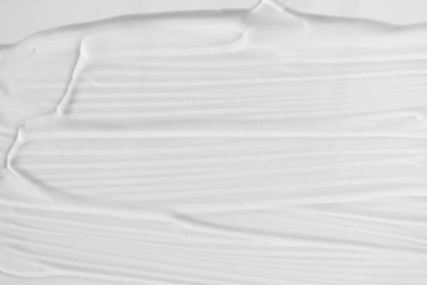 istock Transparent smudge aloe gel lotion on white background, above. Pure texture hydration shampoo or mask. Skincare and body care 1221803543