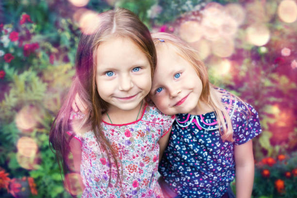 Little cute sisters