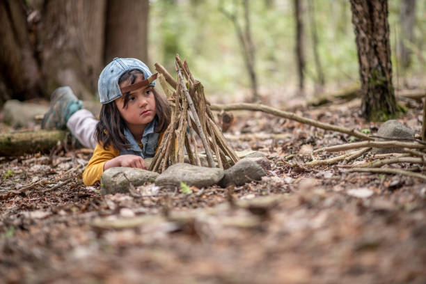 istock Kids in the forest 1221806640