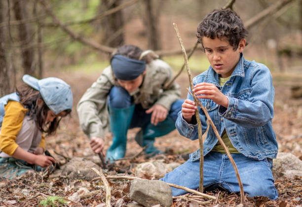 istock Kids in the forest 1221806656