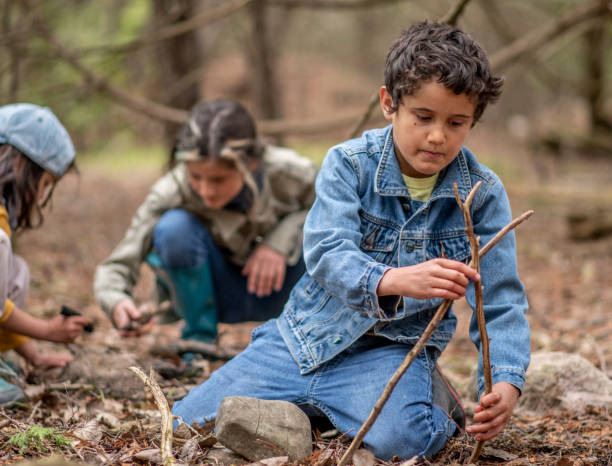 istock Kids in the forest 1221806660