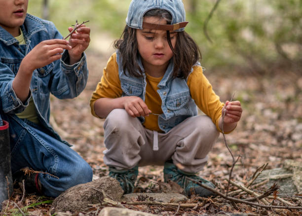 istock Kids in the forest 1221806663