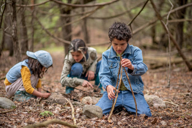 istock Kids in the forest 1221806670