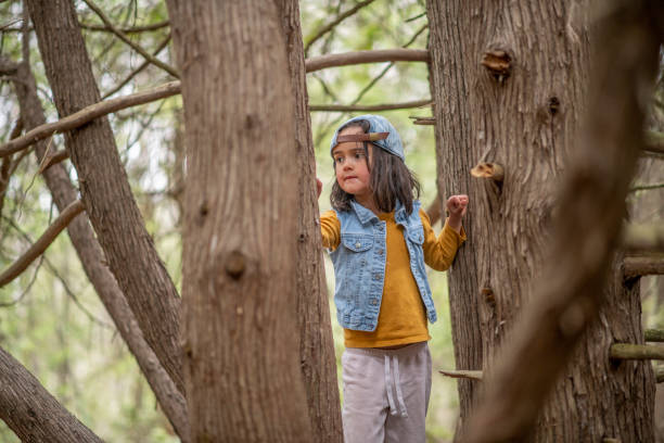 istock Kids in the forest 1221806711