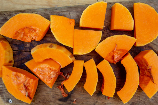 istock ripe orange pumpkin cut in half 1221814149