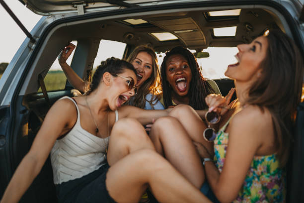istock Friends having fun on road trip 1221814712