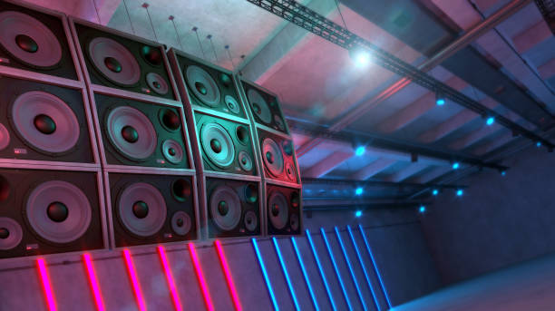 istock Big loudspeakers hanging in an empty music club 1221815530