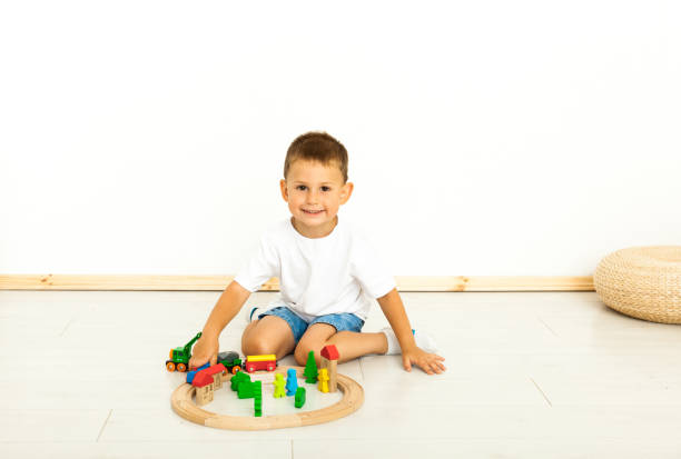 istock Boy playing with toys indoors at home 1221815618