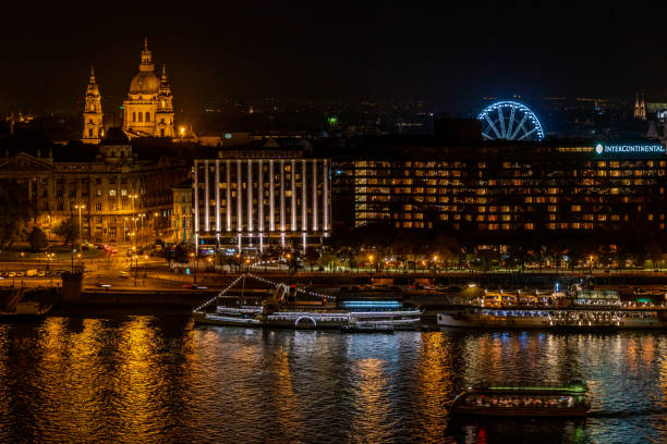 istock Budapest Eye Ferris Wheel and Saint Stephen Basilica nightscape. 1221817421
