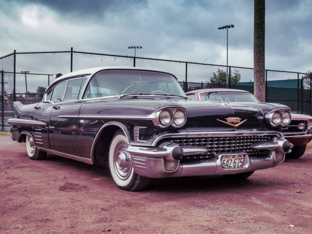 Moncton, New Brunswick, Canada - July 10, 2010 : 1958 Cadillac Series 62 4 door hard top at Annual Atlantic Nationals Automotive Extravaganza on a dark, cloudy day after a light rain in Centennial Park, Moncton, New Brunswick, Canada.