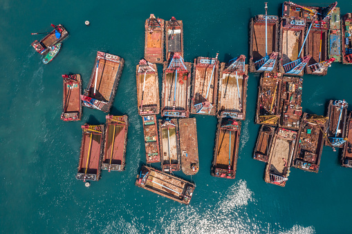 Barges parked along the breakwater, West kowloon