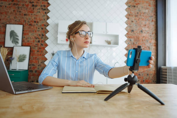 istock Woman making a video call on her smartphone 1221820829