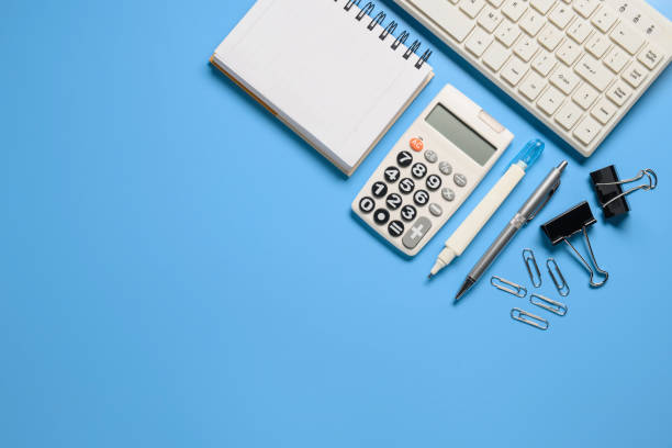 istock Top view,flat lay keyboard,notebook,pen,paperclip or object for office apply on colorful with copy space  background. 1221821798