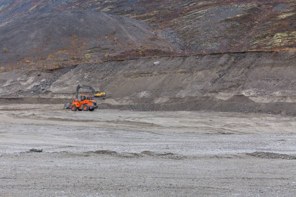 istock Construction machinery works on quarry mining in the Khibiny mountains, Kola Peninsula 1221823725