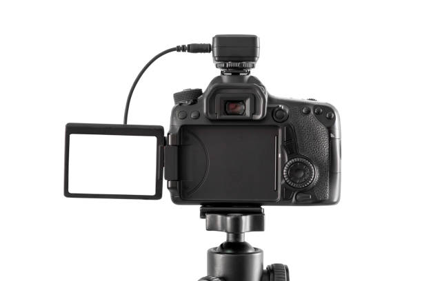 istock DSLR camera  isolated on white  background with clipping path 1221827939