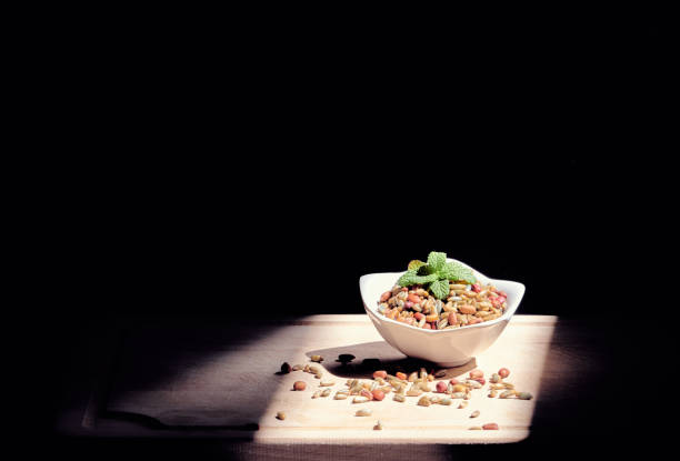 istock Beans and rye with mint leaves on a white bowl 1221828805