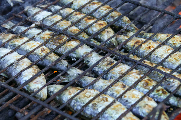 istock Grilled fresh sardines, roasted with charcoal. 1221829910