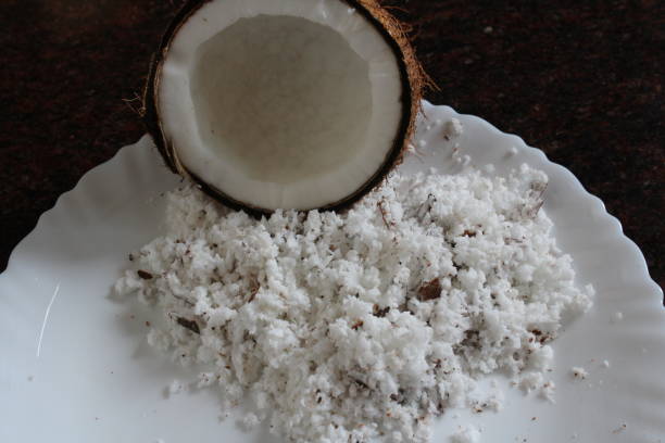 istock Coconut flakes in a plate 1221830977