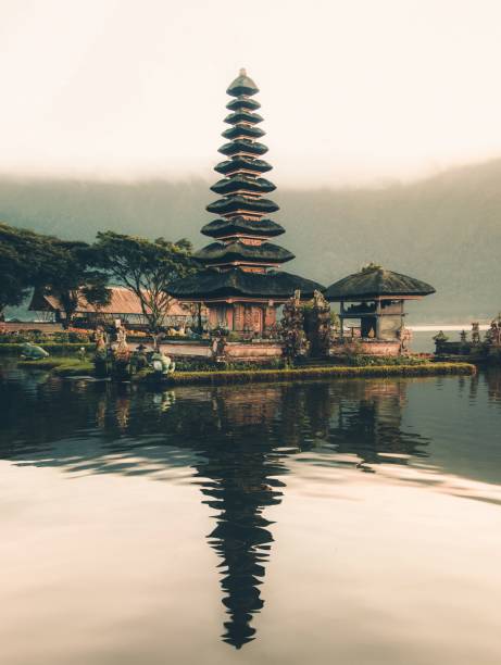 Balinese Temple with water reflection stock photo