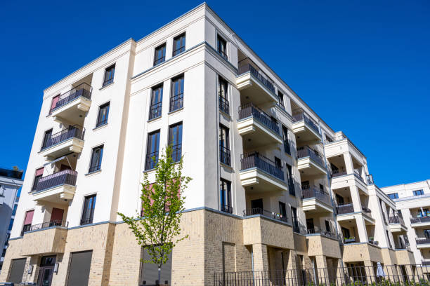 istock New yellow block of flats 1221833700