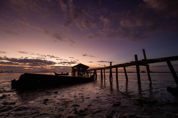istock Dramatic sky at fisherman dove jetty at Jelutong 1221834430